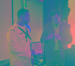 ET1 Chastang receives a letter and token from Bob Whitkop, Jax Chapter President